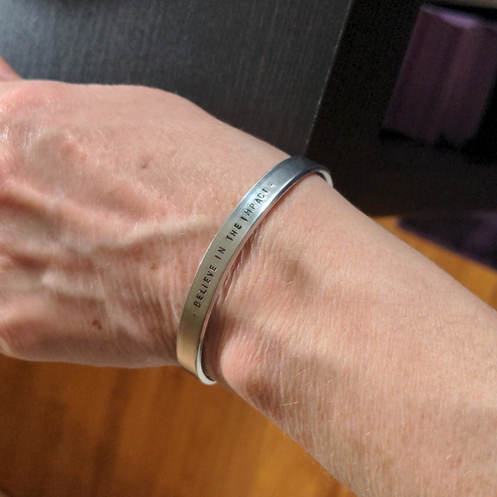 Hand Stamped "Believe In The Impact" Metal Cuff Inspirational Bracelet NIB